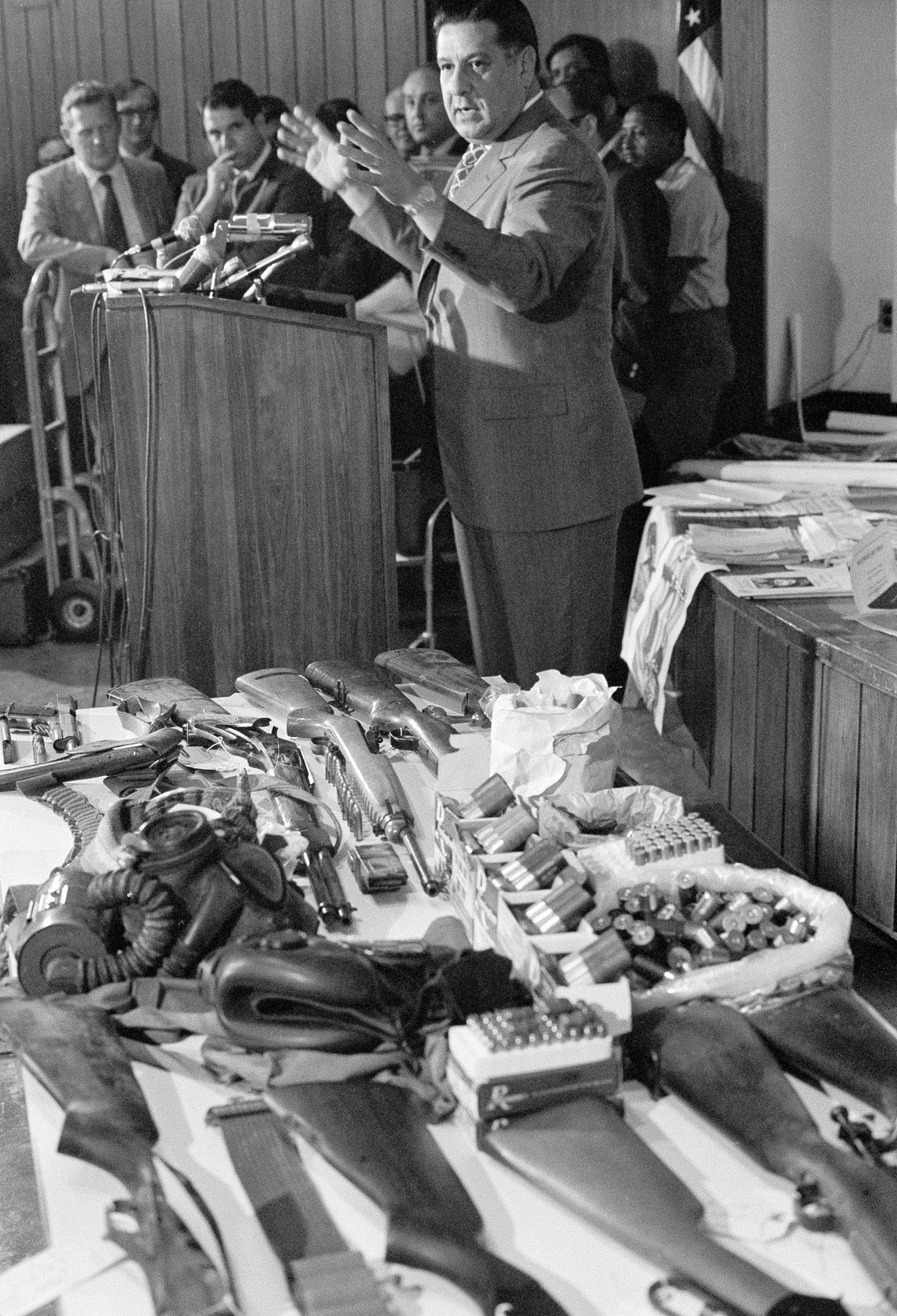 Philadelphia police Commissioner Frank Rizzo with weapons confiscated in a raid on black militant headquarters in 1970.
