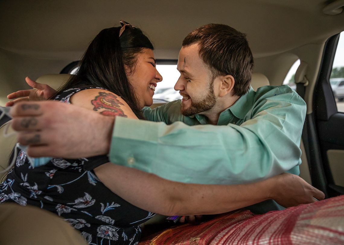 Trent Taylor enters a car and sees his fiancée, Maria Rios, for the first time as a free man after his release from prison. 