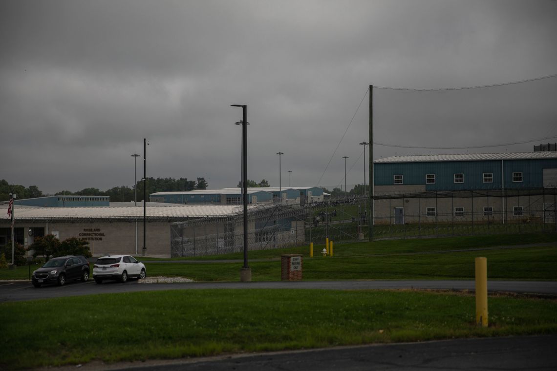 A view of the exterior of the Richland Correctional Institution on a cloudy day. 