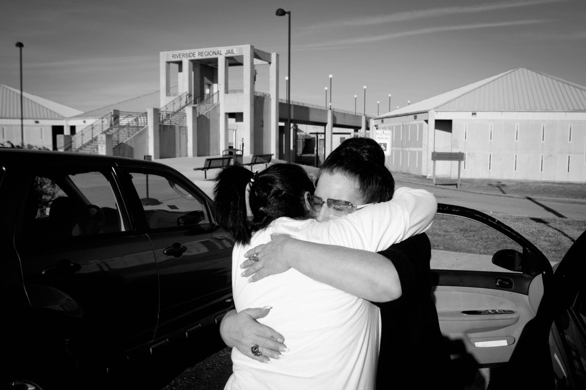 Deborah hugs her daughter Stephanie upon her release from jail.