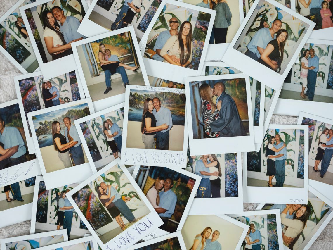 A photo shows an array of Polaroid pictures of Miguel and Silvia together during prison visits. In the Polaroids, Miguel is dressed in a prison uniform of a blue shirt and blue pants. One of the photos has "I Love You Silvia" handwritten on it. Another says "I Love You.”