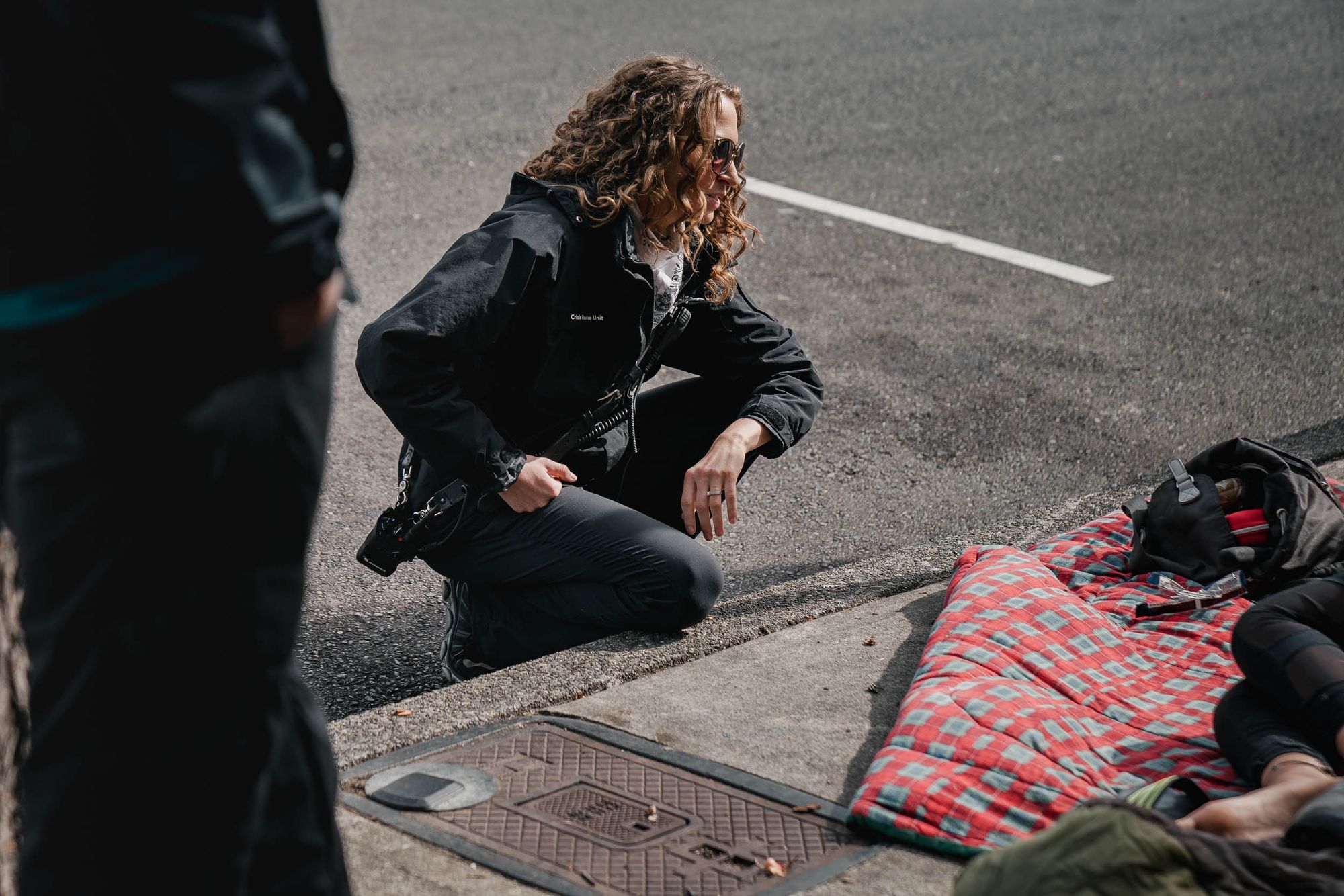 Sundling checks in with an unhoused community member in July.
