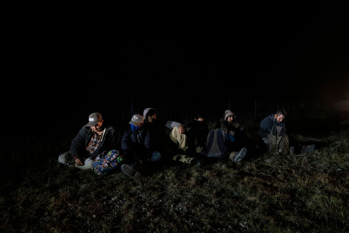 A group of undocumented immigrants from Mexico are detained after Texas Department of Public Safety special agents caught them on private property in Kinney County as part of Operation Lone Star. 