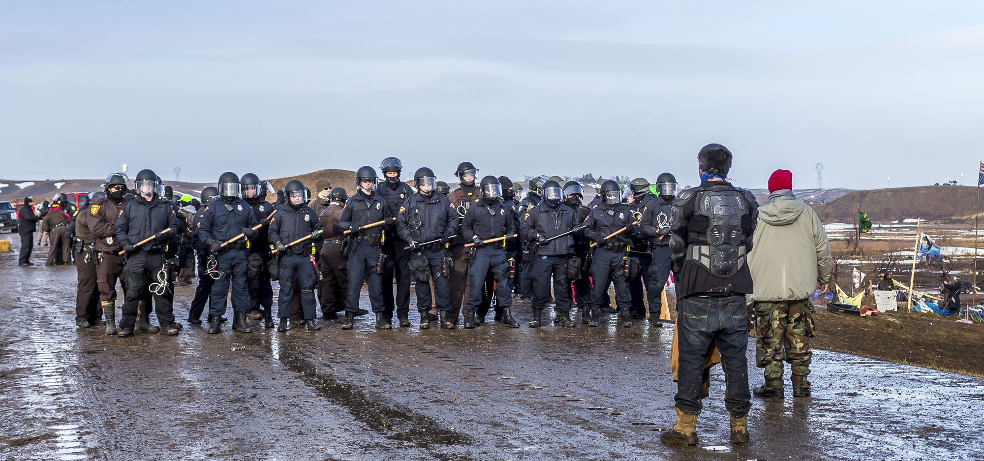 Activists protesting the Dakota Access Pipeline are confronted by law enforcement officers at the Standing Rock Indian Reservation in North Dakota.