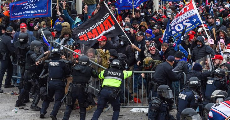 A pro-Trump mob clashes with law enforcement officers during the assault on the Capitol in Washington, D.C. on January 6.