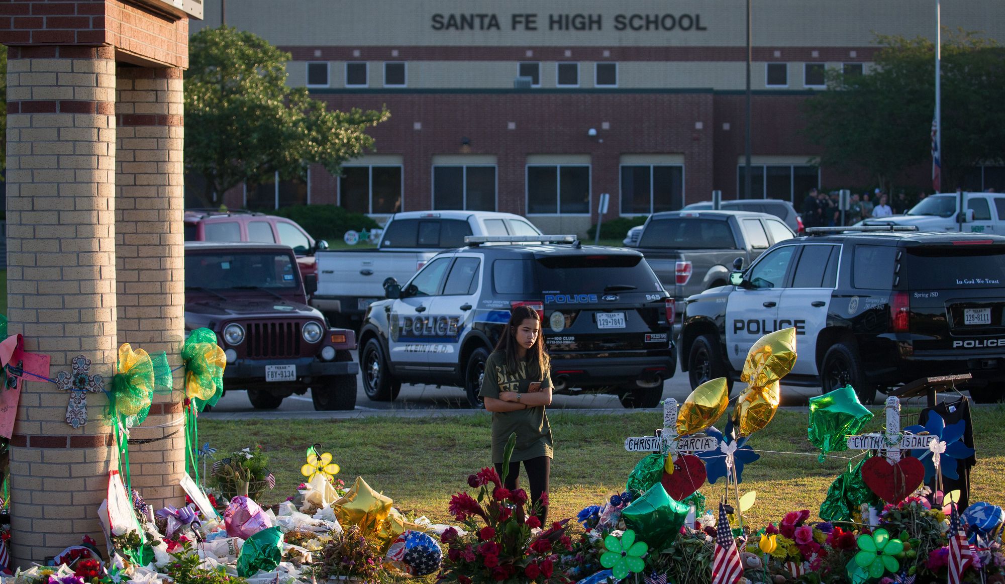 People left flowers at a memorial to shooting victims outside Santa Fe High School, in Santa Fe, Texas, in May. 