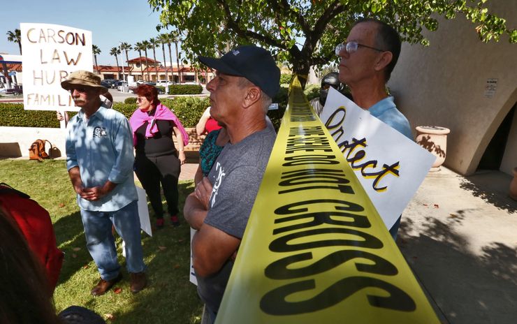 A group of registered sex offenders gather at Carson City Hall in Carson, Calif., demanding an end to restrictions on visiting fast-food restaurants, parks, libraries and other public areas. The city eventually rescinded some of its restrictions under pressure of a lawsuit.