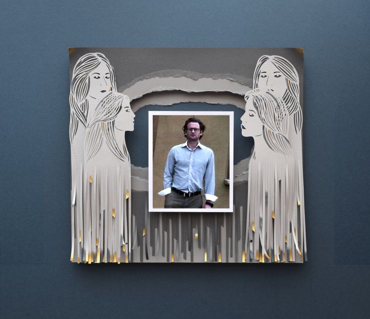 A photo of Leon Jacob, a White middle-aged man wearing a blue dress shirt and glasses, sits in the center of a paper cutting. The paper cutting shows two women on either side of the photo of Leon, with the lower half of their bodies shredded into paper strips.