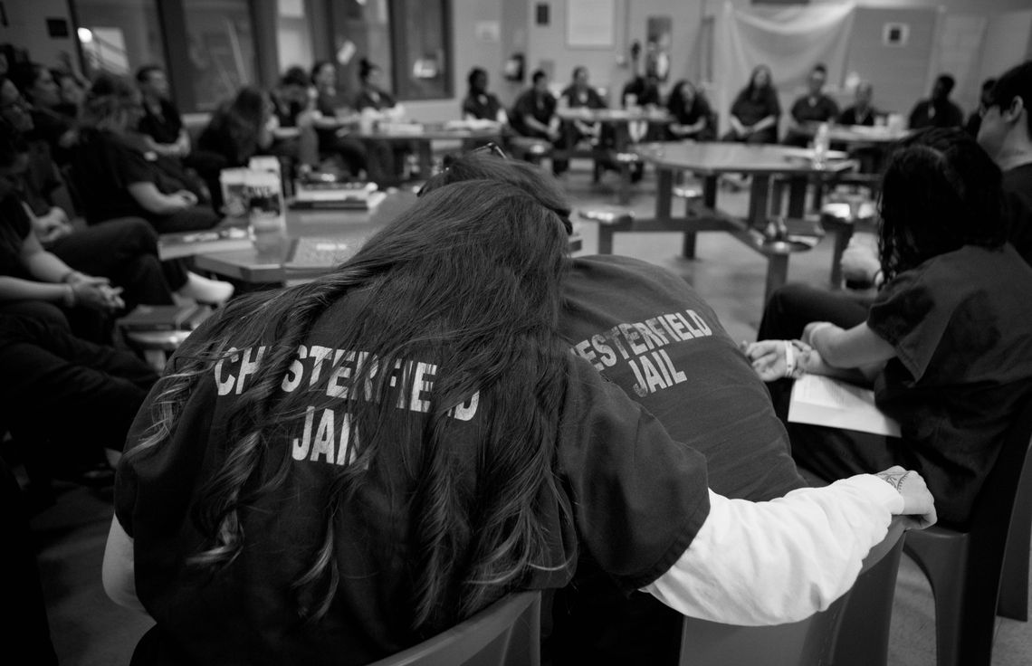 Women participate in a Narcotics Anonymous-style meeting in HARP.