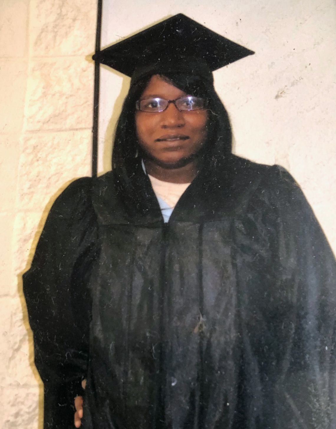 Tiffany Woods at a graduation inside her Louisiana prison.