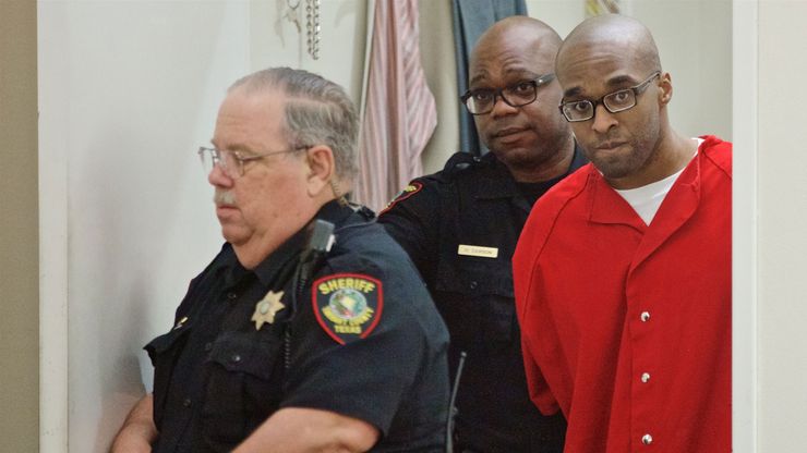 Paul Storey, right, is led into court for a hearing in Fort Worth, Texas, in 2017. Storey was convicted of capital murder in 2008 for the shooting death of Jonas Cherry. 