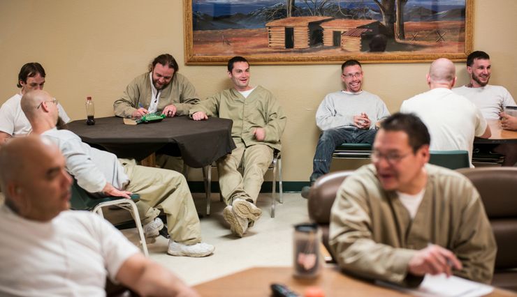 Inmates watch television at the Missouri River Correctional Center, a minimum-security facility in Bismarck, N.D., which has based some of its programs on those found in a prison in Norway.