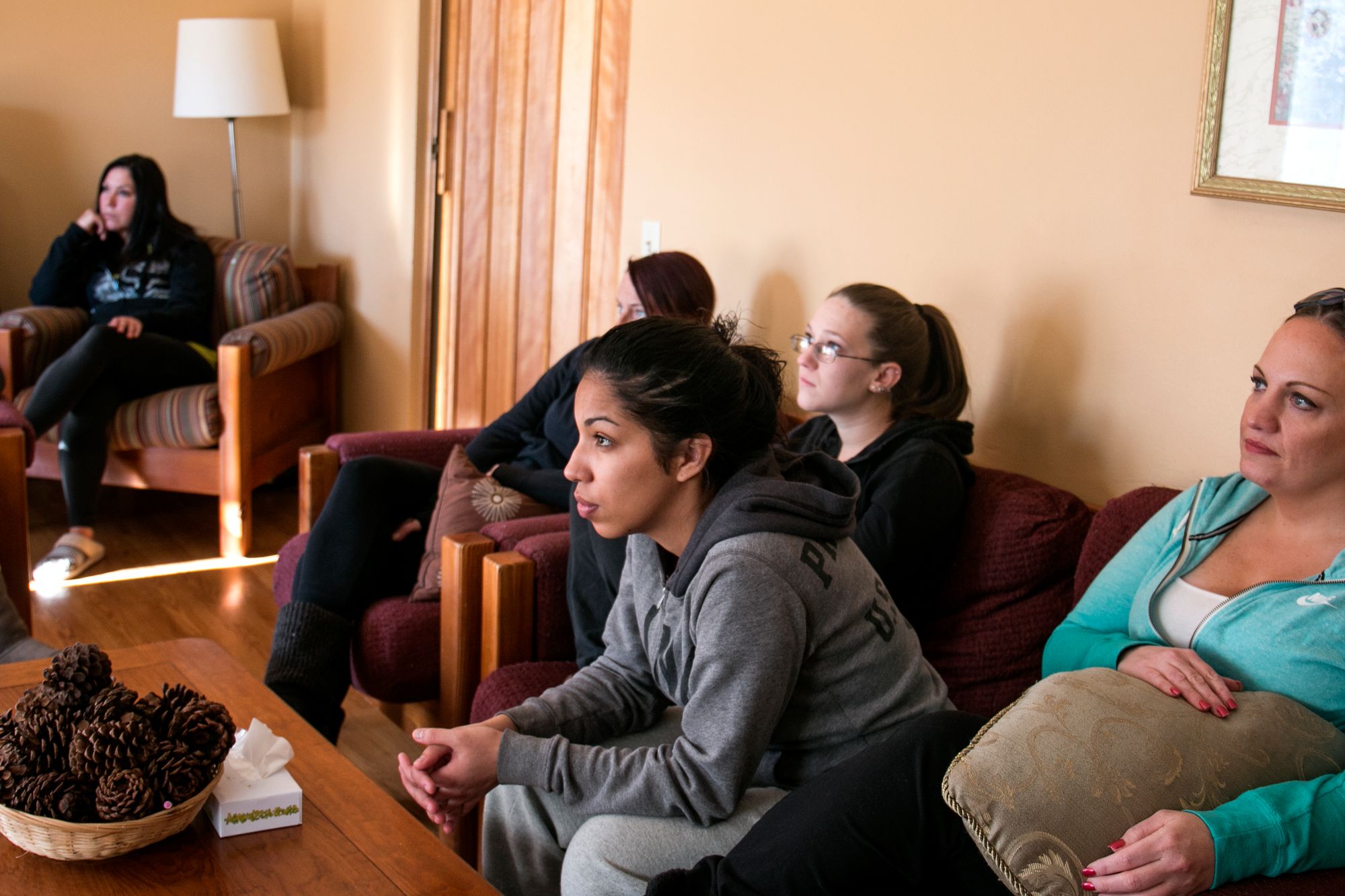 Clients at the Edwina Martin House take part in a music expression therapy class in the home's living room on Jan. 6, 2016.