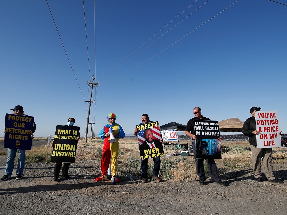 Corrections officers protest working conditions and staff shortages outside the Federal Correctional Institution in Mendota, Calif., in May.