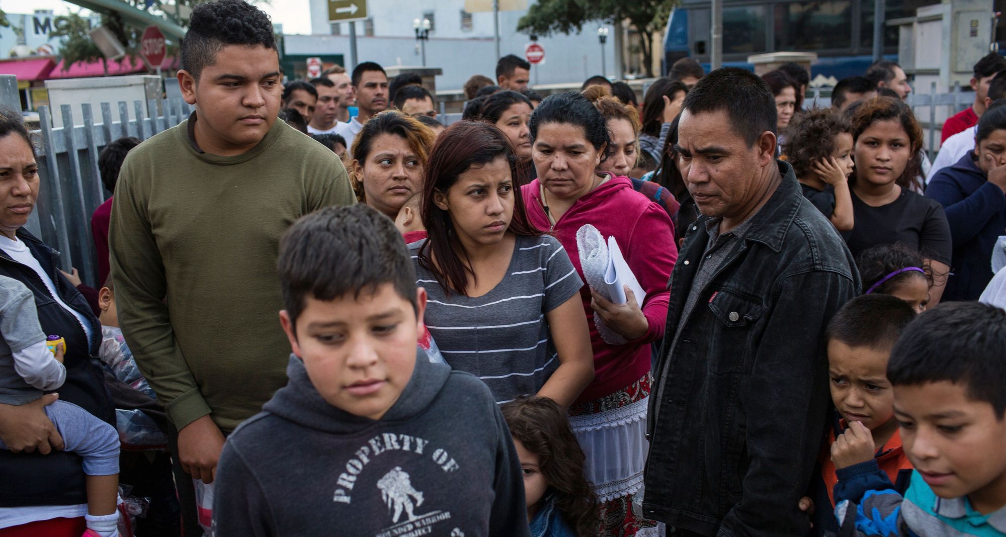 Recent undocumented border crossers arrive at a bus station in McAllen, Texas, after they were processed and released by U.S. Customs and Border Protection.  