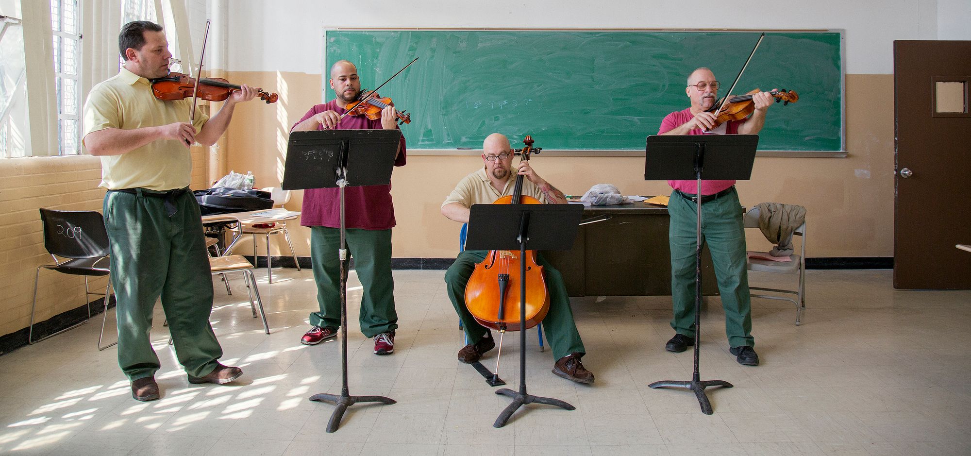 Jason Naradzay, far left, plays violin as part of the Riverside Quartet at Sing Sing Correctional Facility.  