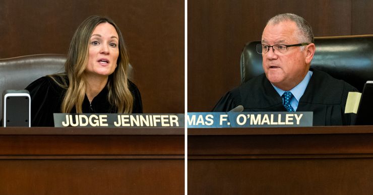 A diptych photo shows Judge Jennifer O'Malley, left, a White woman, and Judge Thomas F. O'Malley, right, a White man, in judge's robes and seated in a courtroom.  