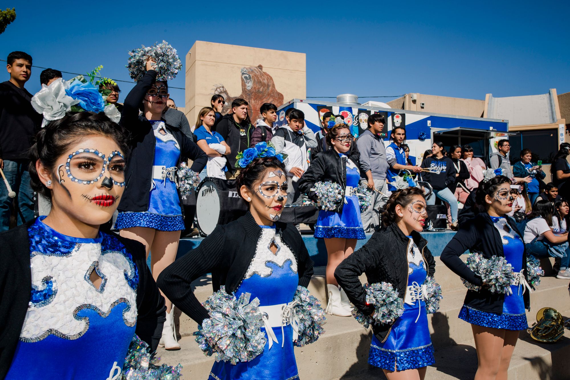 Members of the Bowie dance team have their faces painted as Catrina, the iconic symbol of the Mexican holiday of Día de los Muertos.