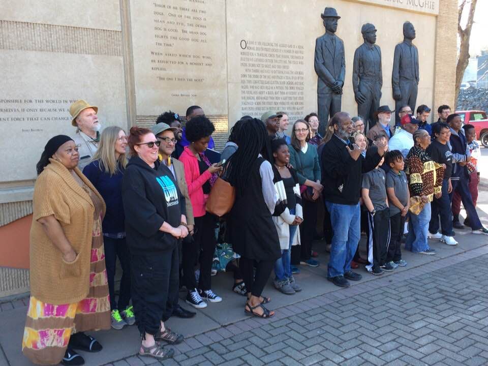 The Duluth, Minn. delegation to the National Memorial for Peace and Justice in Montgomery, Ala. gathers in front of the Clayton, Jackson, McGhie Memorial to that city's 1920 lynching before boarding a bus for a 1,223-mile journey to Alabama in April. 