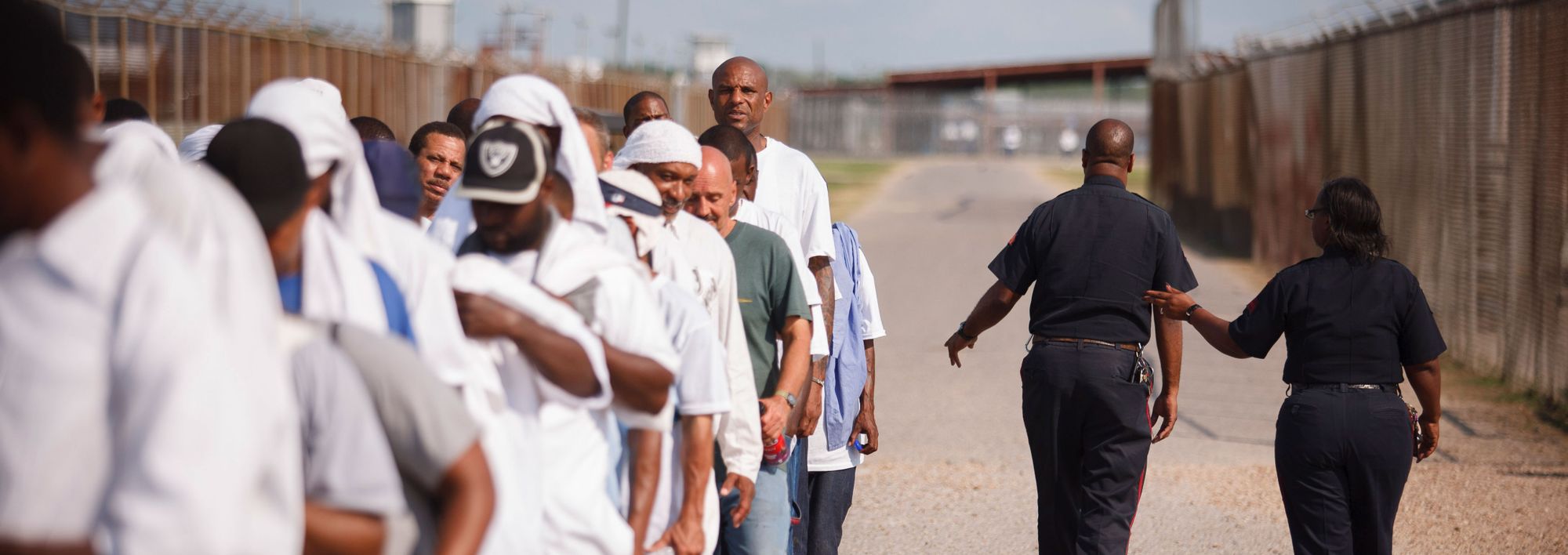 Prisoners in Angola, Louisiana, where the state prison population has dropped by 5.4 percent.