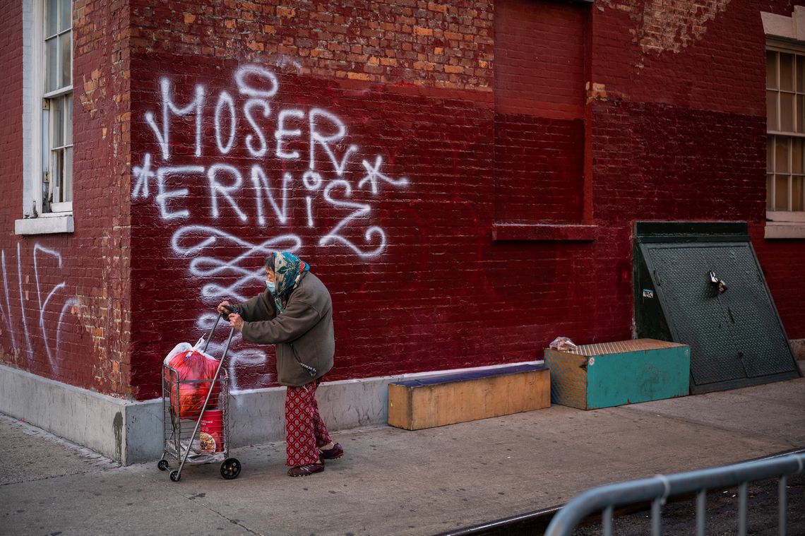 An older pedestrian in Chinatown.