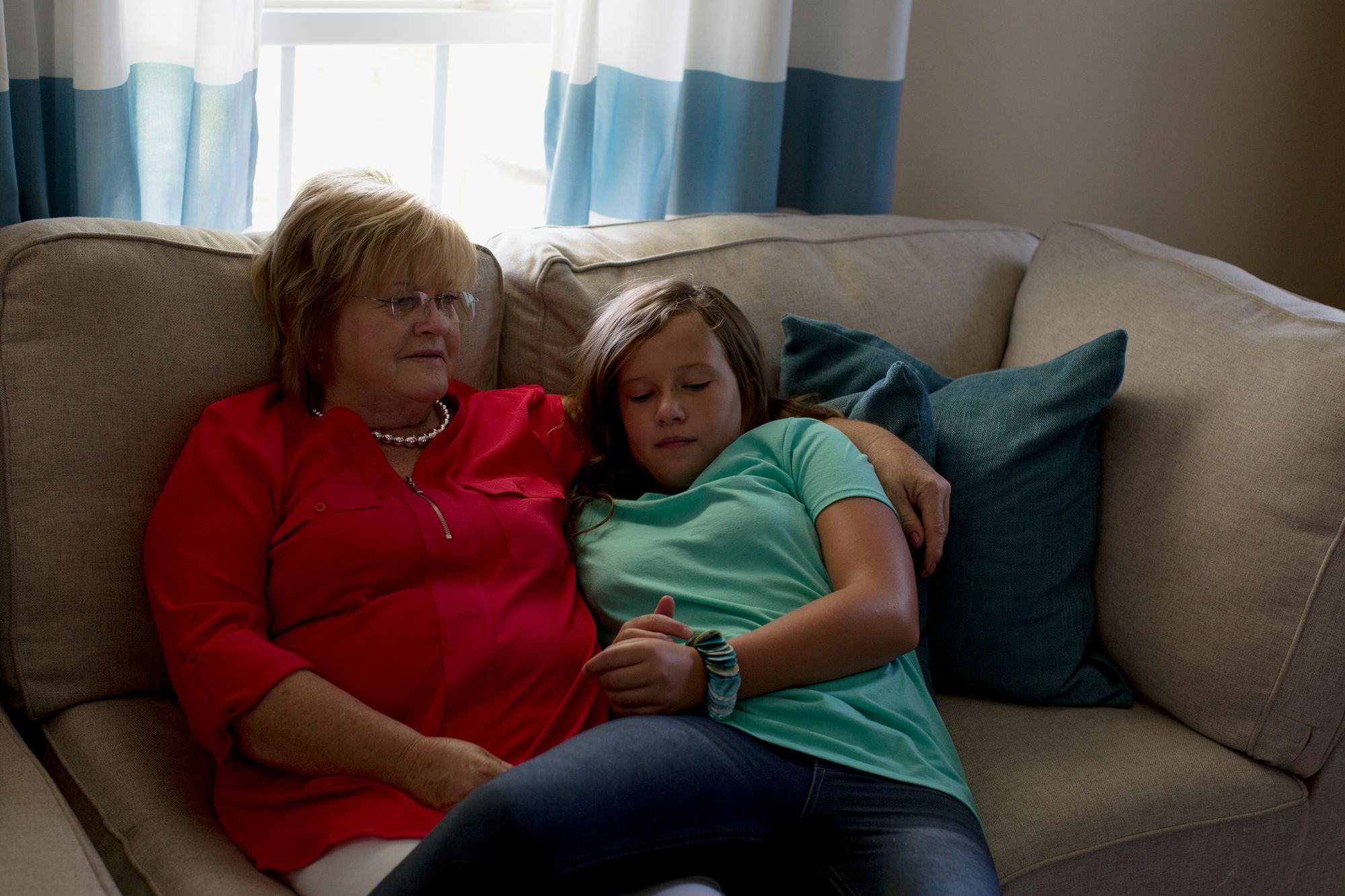 Sheila Grant, mother of Bradley Grant, with her granddaughter in Harlan, Ky., in August. 