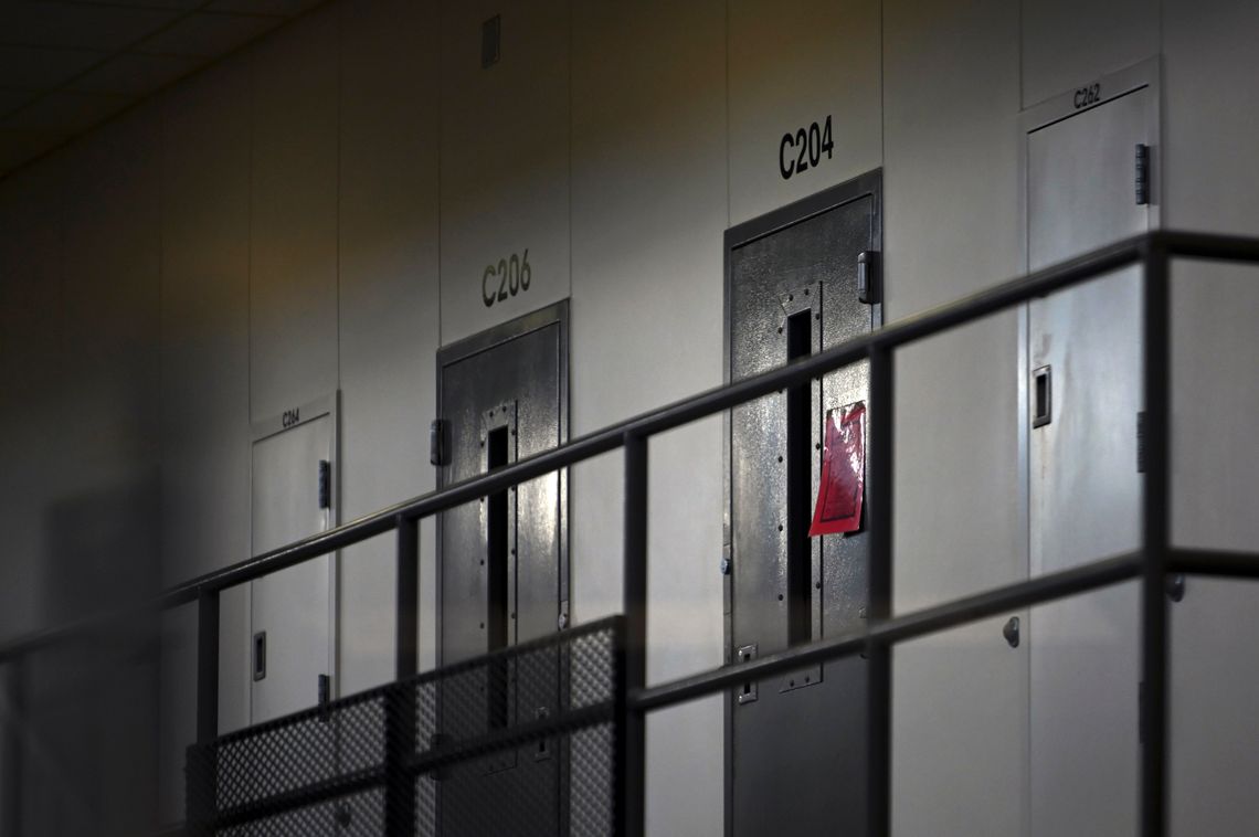 A red tag hangs on a cell door, signifying an incarcerated person with COVID-19 at Faribault Prison in Minnesota in January.