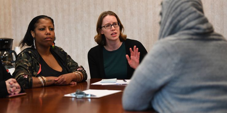 Dr. Erin Zerbo, center, who runs the Newark, N.J., CARE Center (Center for Addiction Resources & Education), talks with a group of patients, including Cydiaa Williams, at left. 