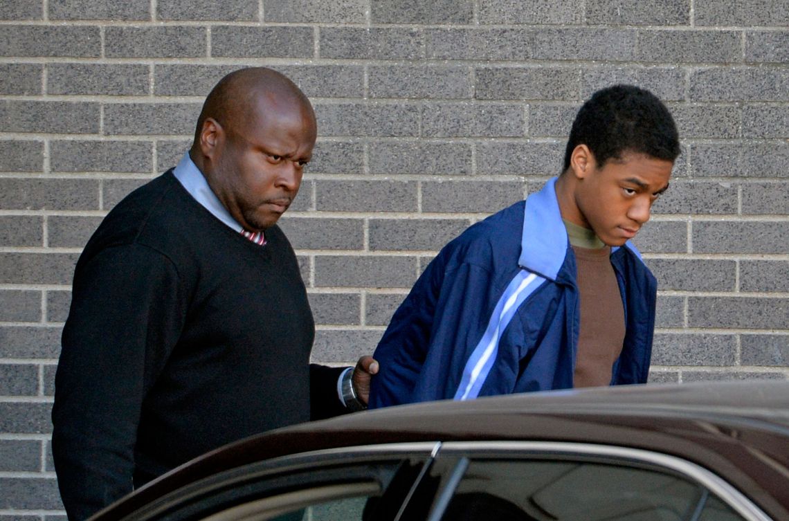 Anderson being escorted to his arraignment on March 21, 2014. 