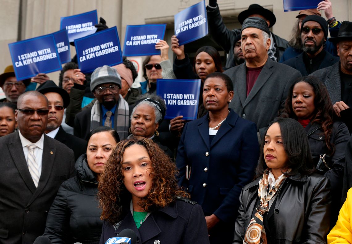 Baltimore State's Attorney Marilyn Mosby, center, speaks at a rally in St. Louis in support of Circuit Attorney Kimberly M. Gardner's lawsuit against her city's leadership.