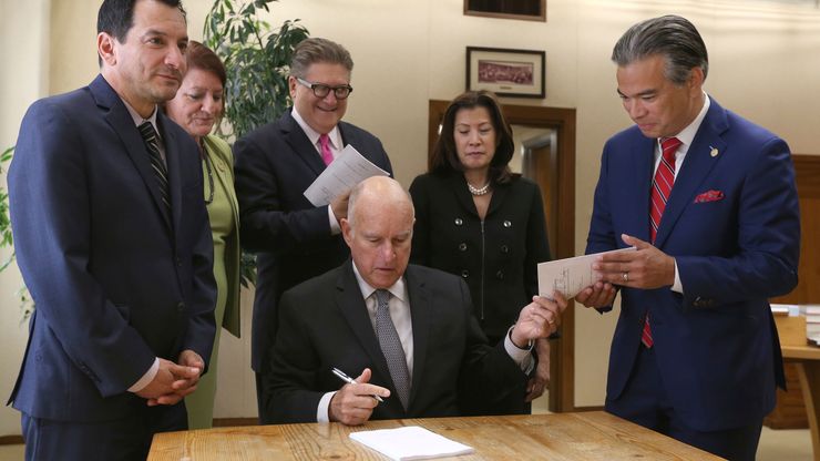 Gov. Jerry Brown signed a bill to end bail on Tuesday in Sacramento, Calif. The bill makes California the first state to eliminate bail for suspects awaiting trial. 