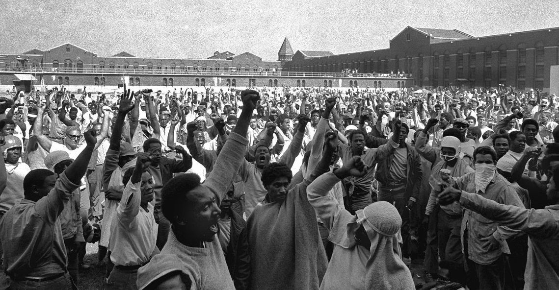Inmates at Attica shouted their demands during a negotiating session with state corrections officials in September 1971.