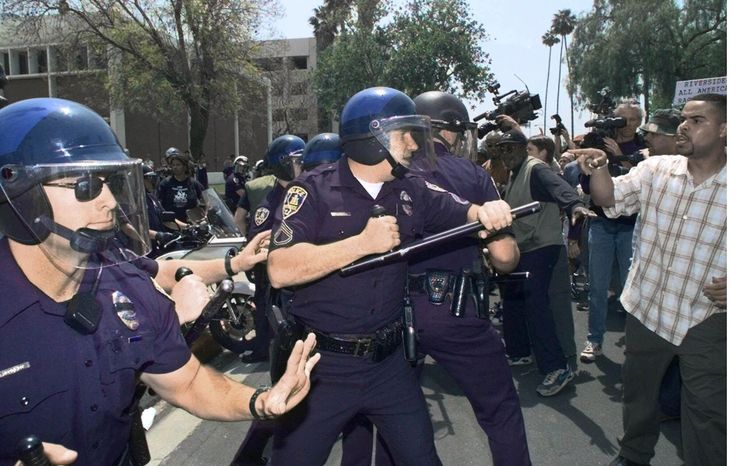 Riverside police squared-off with demonstrators in 1999 after the district attorney announced that four police officers would not be held criminally responsible for the shooting death of Tyisha Miller. 