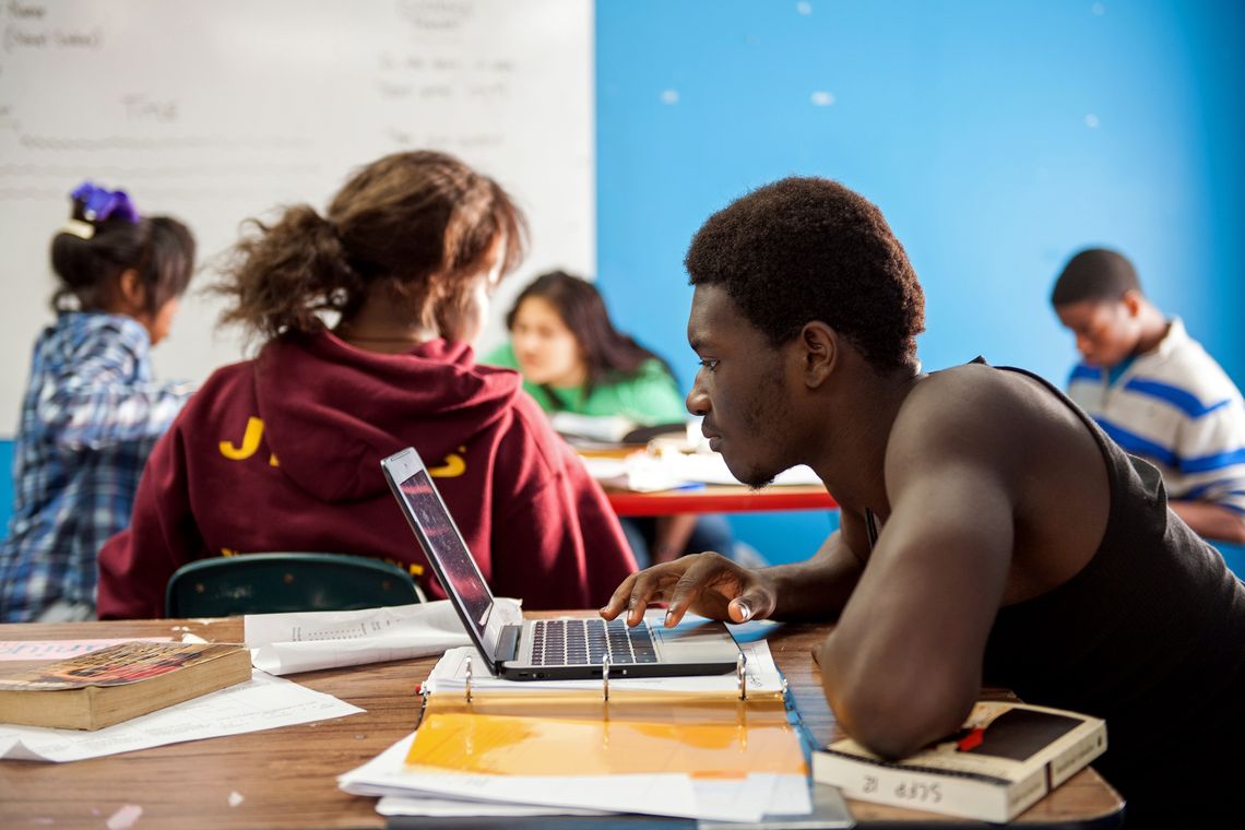 A student does homework at the Sunflower County Freedom Project, an after-school program in the delta.