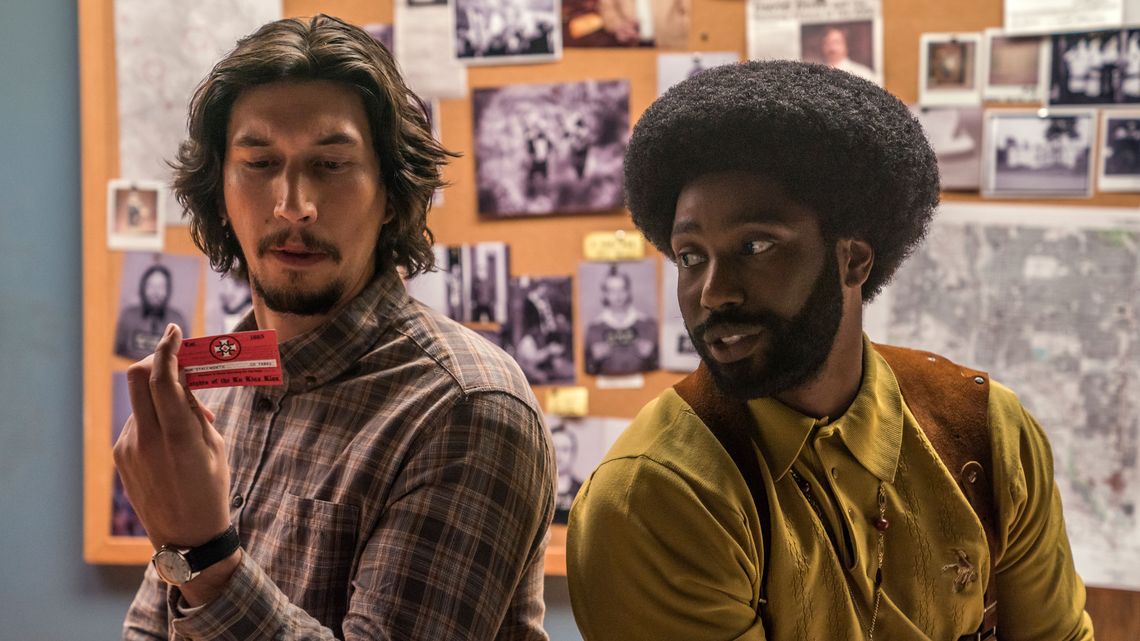 Adam Driver as Flip Zimmerman and John David Washington as Ron Stallworth in Spike Lee’s “BlacKkKLansman”. 
