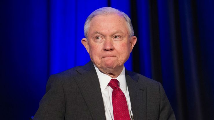 Attorney General Jeff Sessions waits onstage to address the National Sheriffs’ Association Winter Conference in Washington, Feb. 12, 2018. 