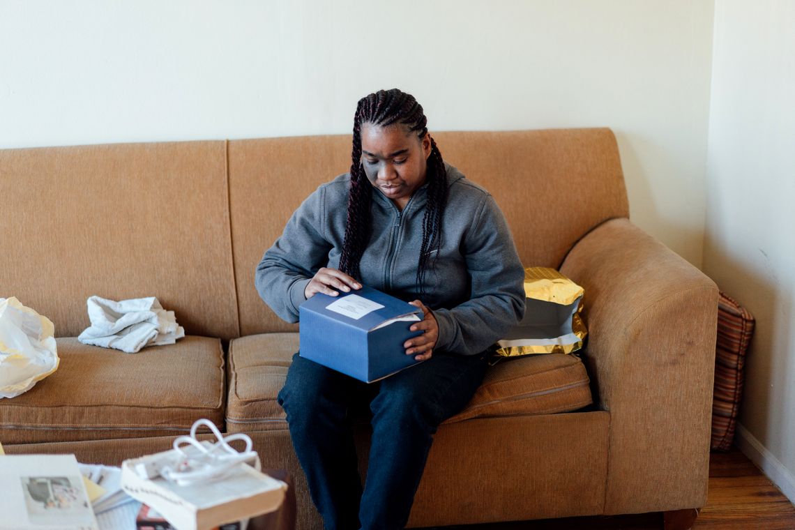 Emmerine Crowder holds the cremated remains of her brother, William, who was killed in March 2013 by his cellmate in Menard’s solitary unit.
