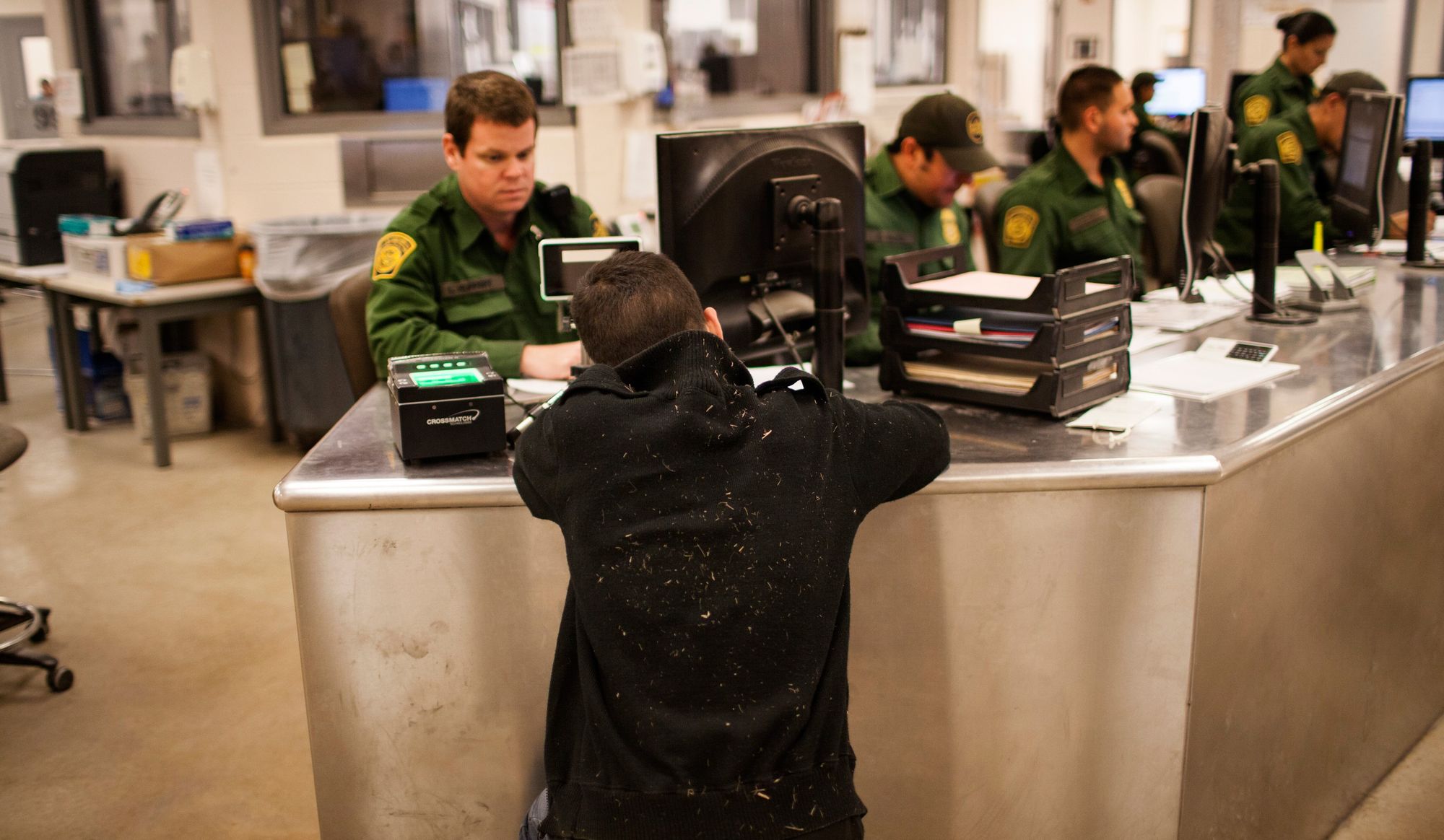 An unaccompanied boy from Guatemala is processed at the Customs and Border Protection Rio Grande Valley sector headquarters in Texas, in 2013. 