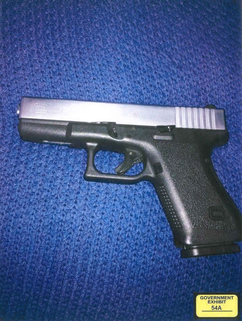 a Glock handgun, a type Lewisbey sold, 