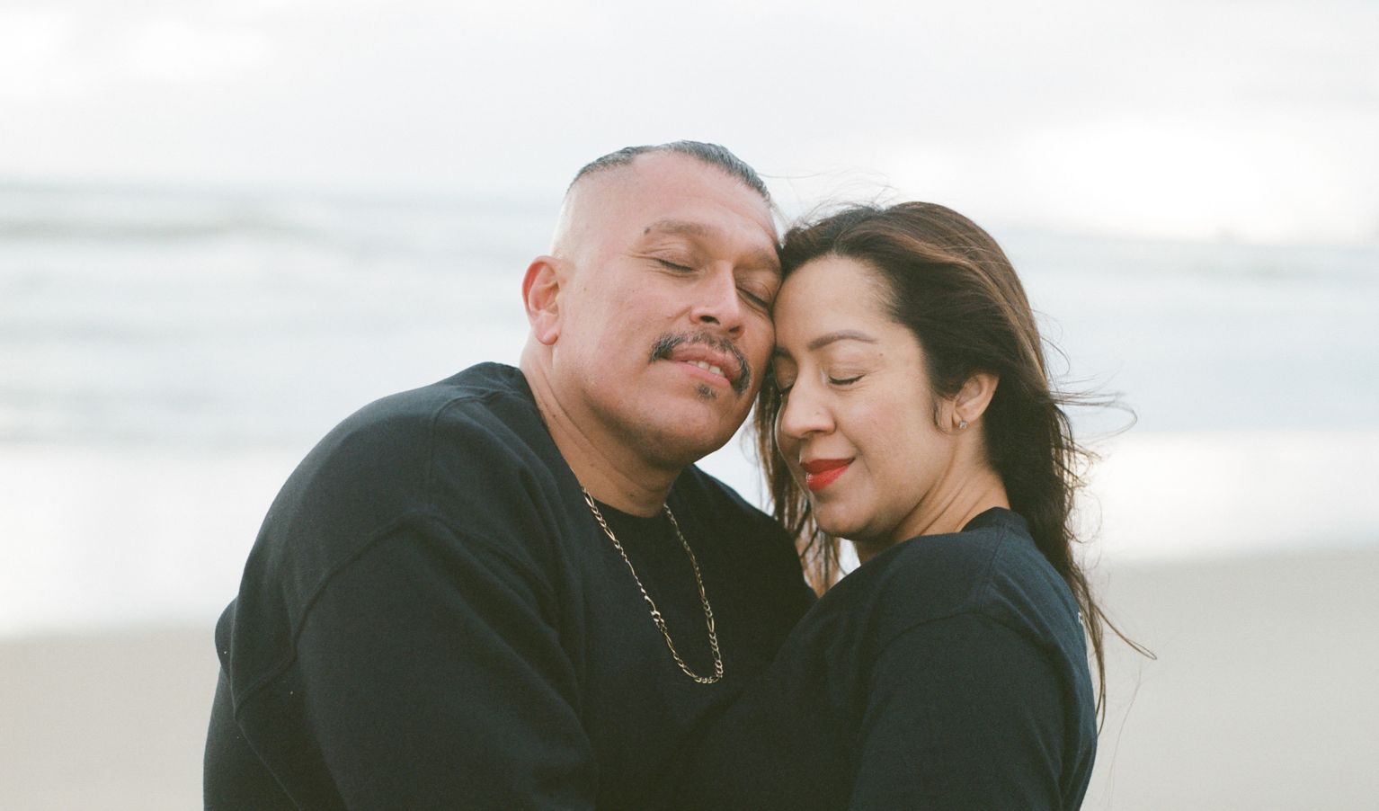 Miguel and Silvia Solorio by the Atlantic Ocean on Hungtinton Beach, the first place Miguel and Silvia went after Miguel got out, where they spent the weekend reconnecting.