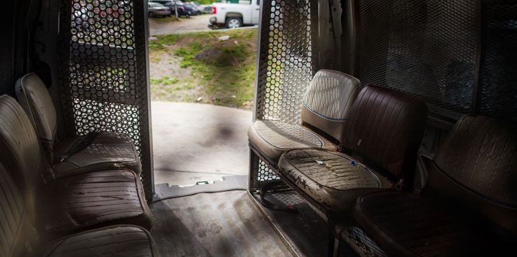 A former Prisoner Transportation Services van at an automotive repair shop in Smyrna, Tenn., in 2016.