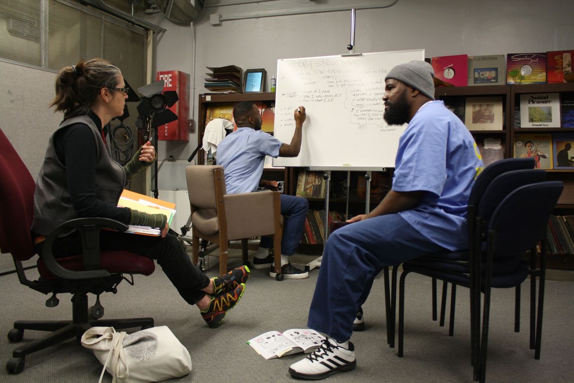 Nigel Poor, Antwan Williams and Earlonne Woods work during a story pitch session. 