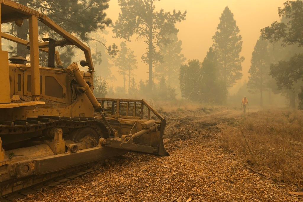 Matthew Hahn and volunteers from the Bonny Doon, California, community built a fire break in August. They scraped the earth to mineral soil so the fire cannot burn past it. 