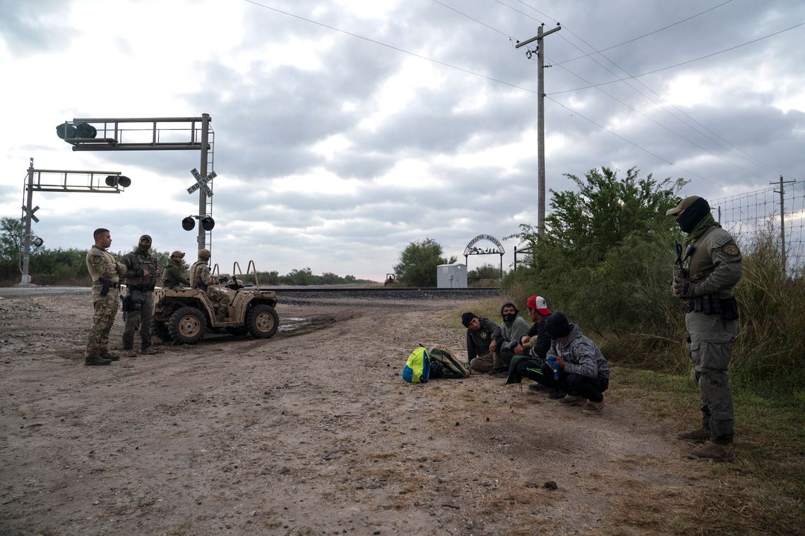 Texas Department of Public Safety agents arrest people caught on private property as part of Operation Lone Star last year. The owner of the property signed an affidavit allowing DPS to make arrests like these.