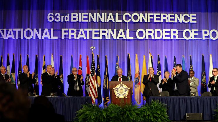 Attorney General Jeff Sessions, center, speaks at the Fraternal Order of Police convention in Nashville, Tenn., in August.