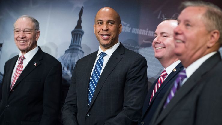 From left, Sens. Charles Grassley, Cory Booker, Mike Lee and Lindsey Graham at a news conference on the passage of the criminal justice reform bill, the First Step Act.