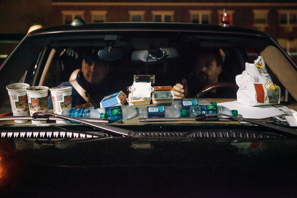 Bondsmen during a stakeout in Bushwick, Brooklyn. 