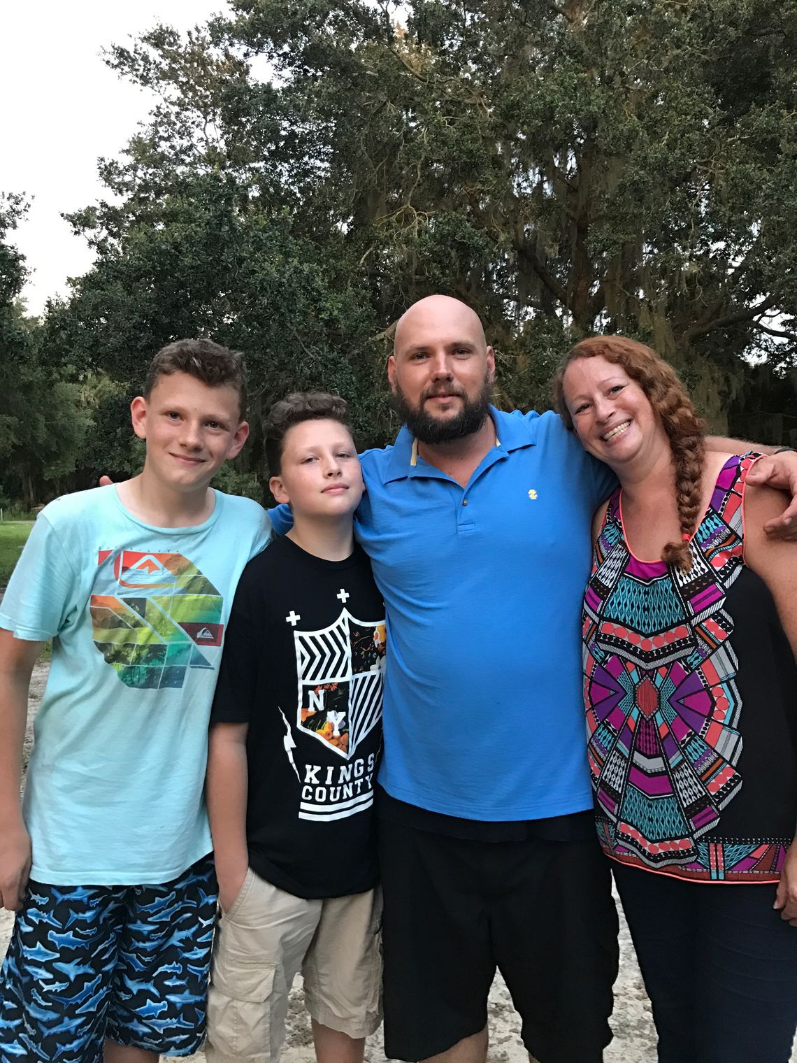 Robert Woodall with his fiancée, Stephanie Walker, and children, Robby and Lance, in Umatilla, Fla.