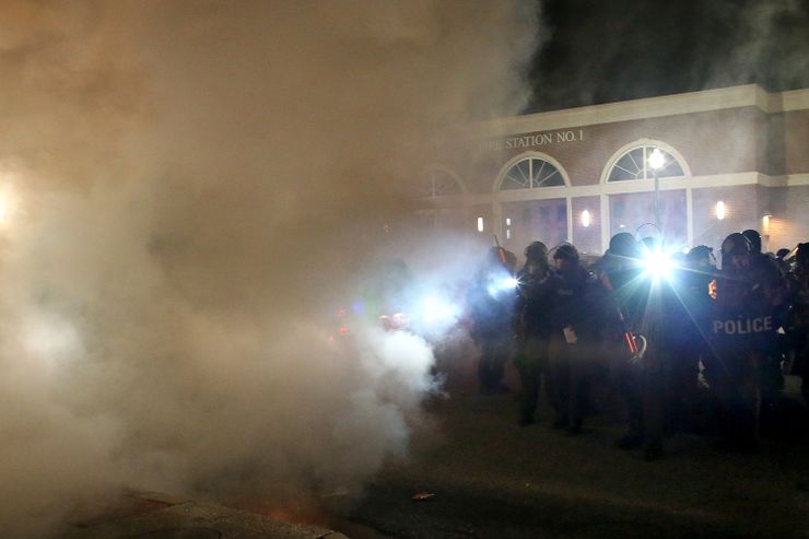 Police used tear gas to disperse demonstrators after the announcement of the grand jury decision in Ferguson, Mo., on Monday.