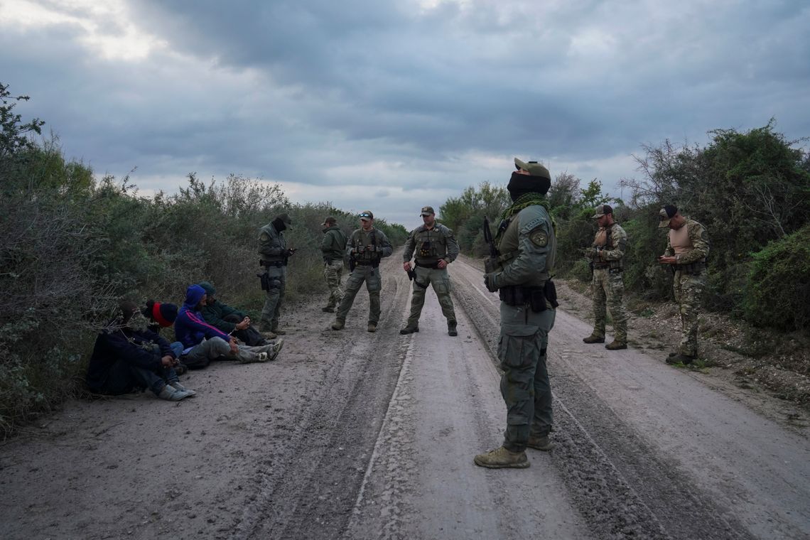 Texas Department of Public Safety special agents monitor four undocumented immigrants from Honduras who were caught on private property in Kinney County.